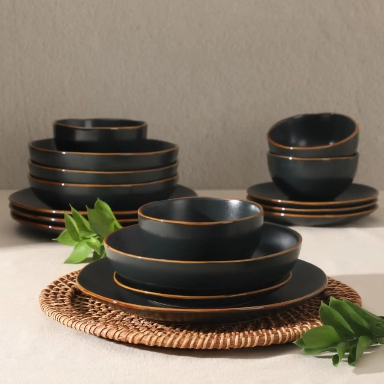 16-Piece Black Stoneware Dinnerware Set - Durable Ceramic Plates and Bowls for Everyday Dining