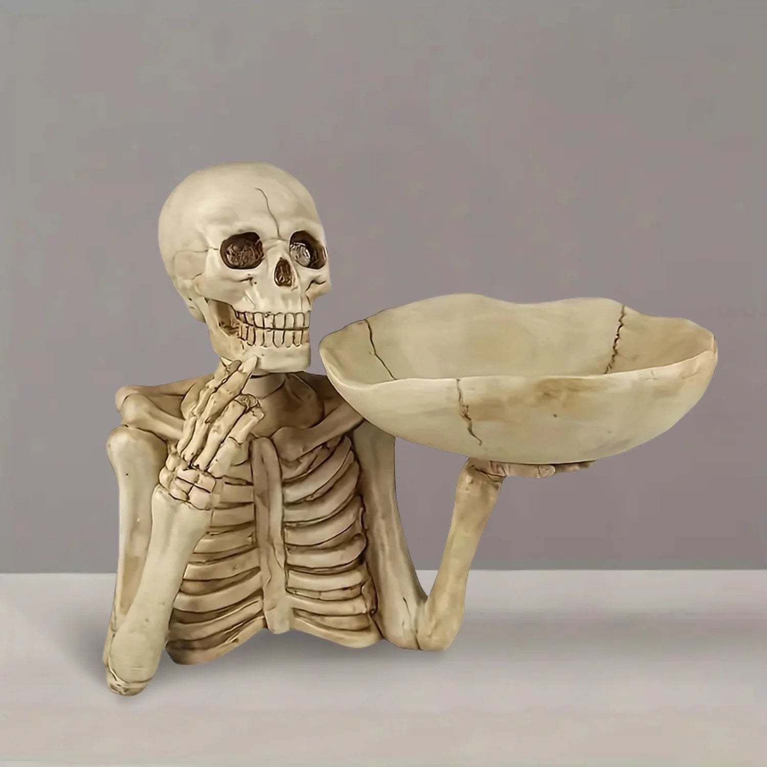 Halloween Candy Bowl resin skeleton tray decoration with bowl. Unique skeleton design suitable for indoor and outdoor decoration