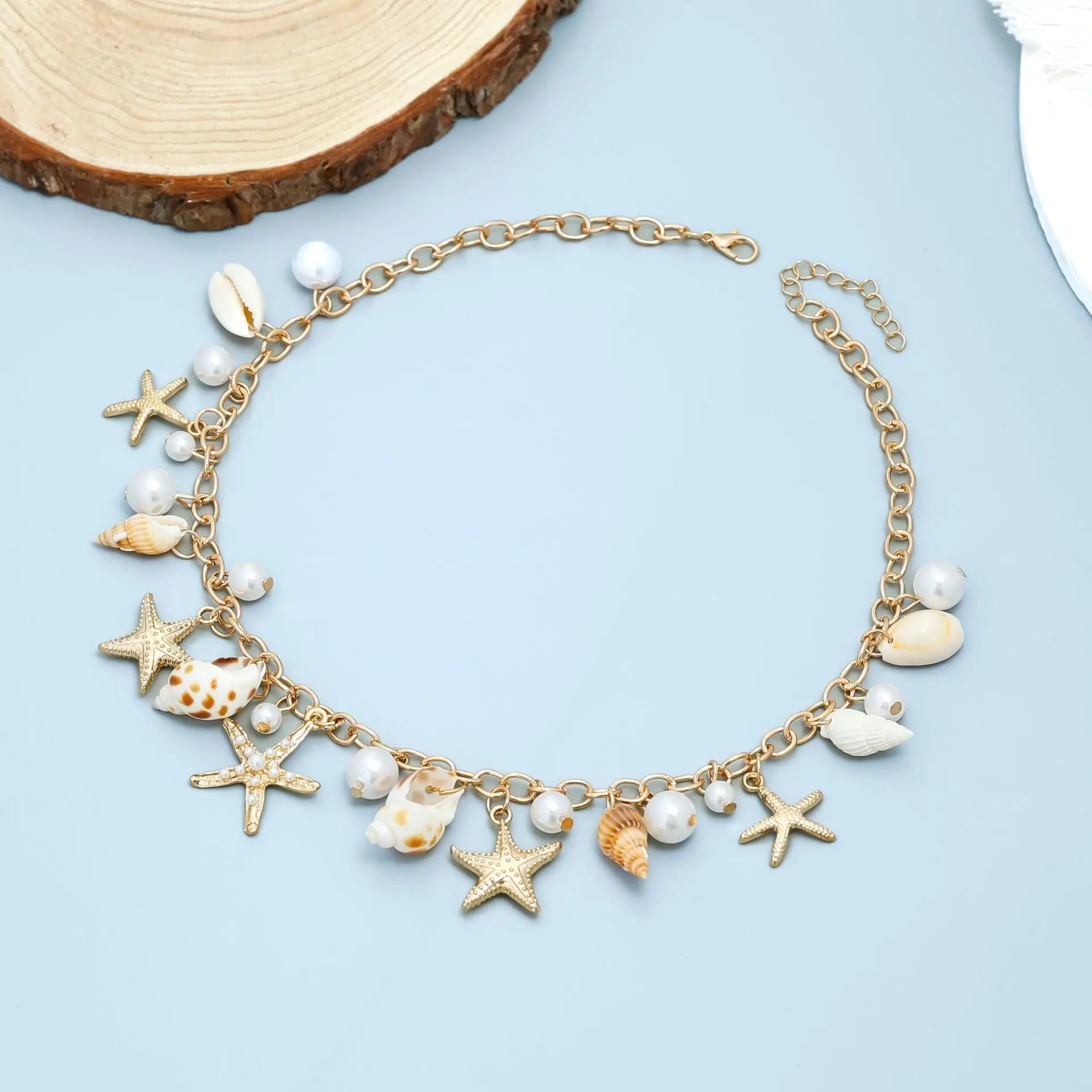 Bohemian style gold color waist chain with seashell and starfish pendant,faux pearl body chain, beach party fashion accessory.